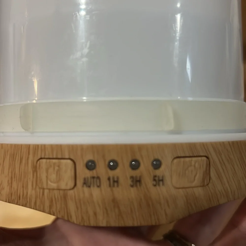 White Ceramic Aromatherapy Diffuser with a bottle of FOCUS essential oil